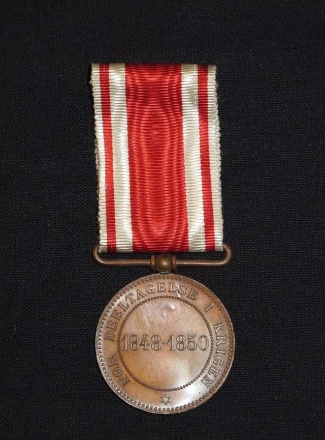 Bagsiden af erindringsmedaljen til danske soldater for deltagelse i Første Slesvigske Krig 1848-50